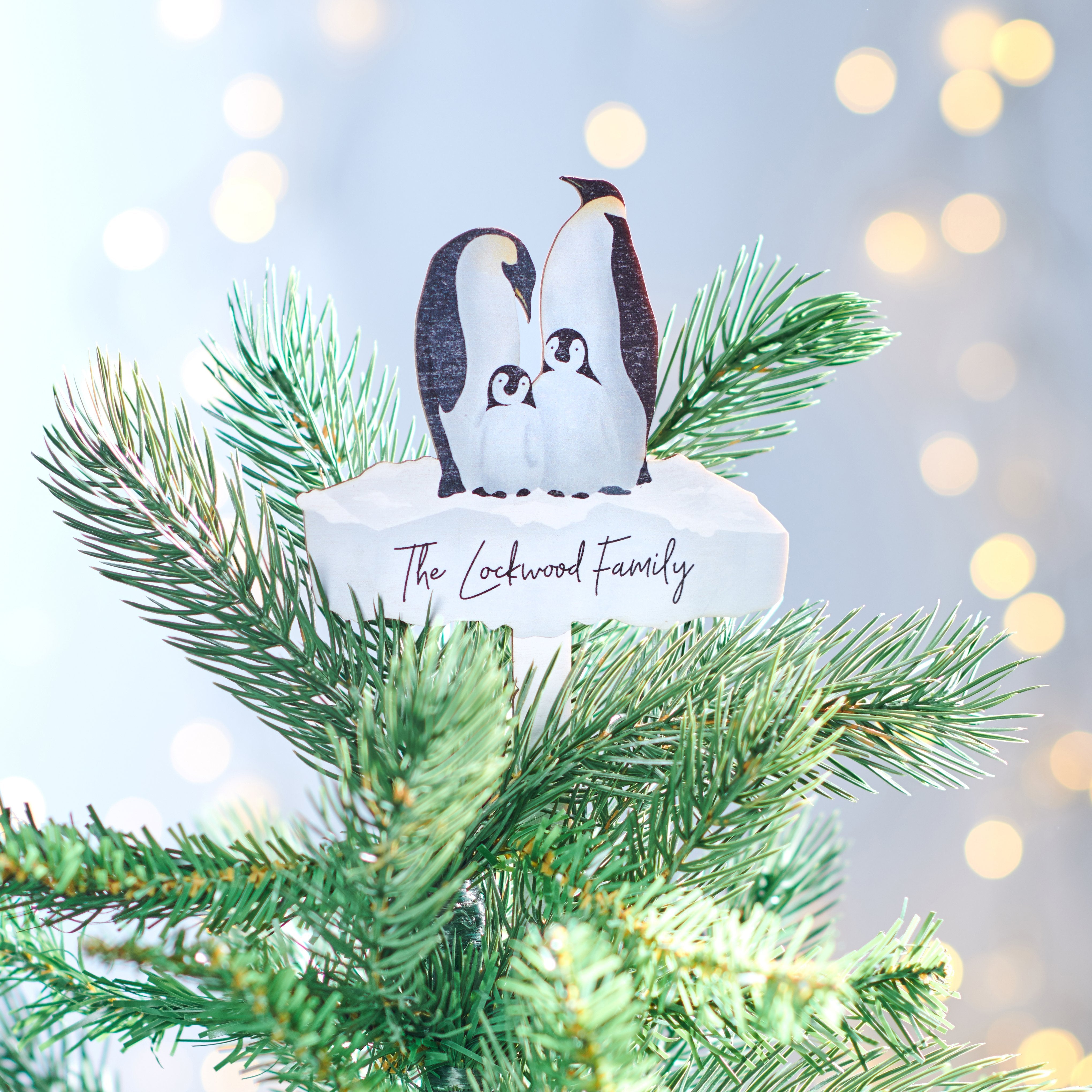 https://www.oakdenedesigns.com/cdn/shop/products/oakdene-designs-christmas-decorations-personalised-penguin-family-tree-topper-28339221430343.jpg?v=1675190555